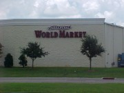 Sign installed Metairie World Market channel letters